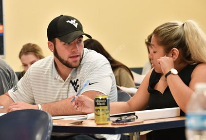 WVU student getting tutored.